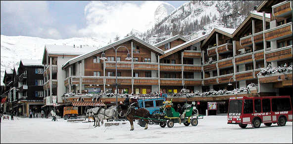 Zermatt taxis - electric vans and horse drawn carriages
